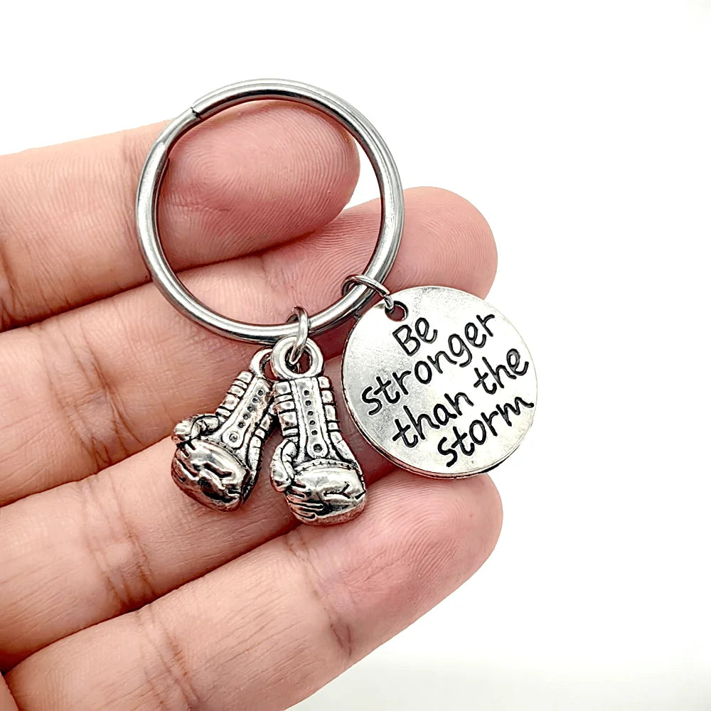 Keychain With The Positive Message ("Never never give up!"/"Be stronger than the storm"/"Do what you love, love what you do") With Boxing Gloves - 3 Styles