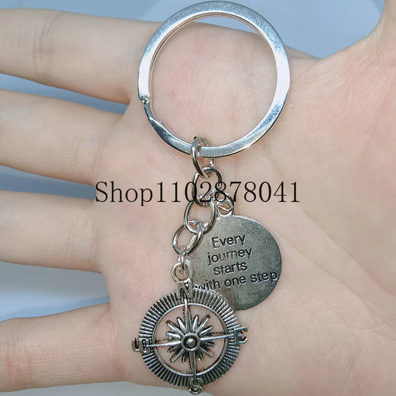 Keychain With The Positive Message ("Every journey starts with one step") With Compass