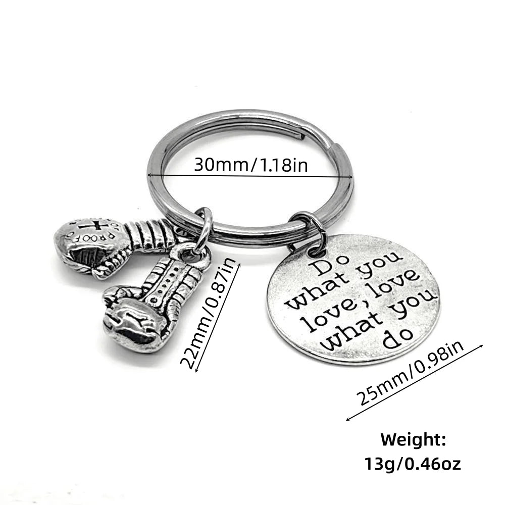 Keychain With The Positive Message ("Never never give up!"/"Be stronger than the storm"/"Do what you love, love what you do") With Boxing Gloves - 3 Styles