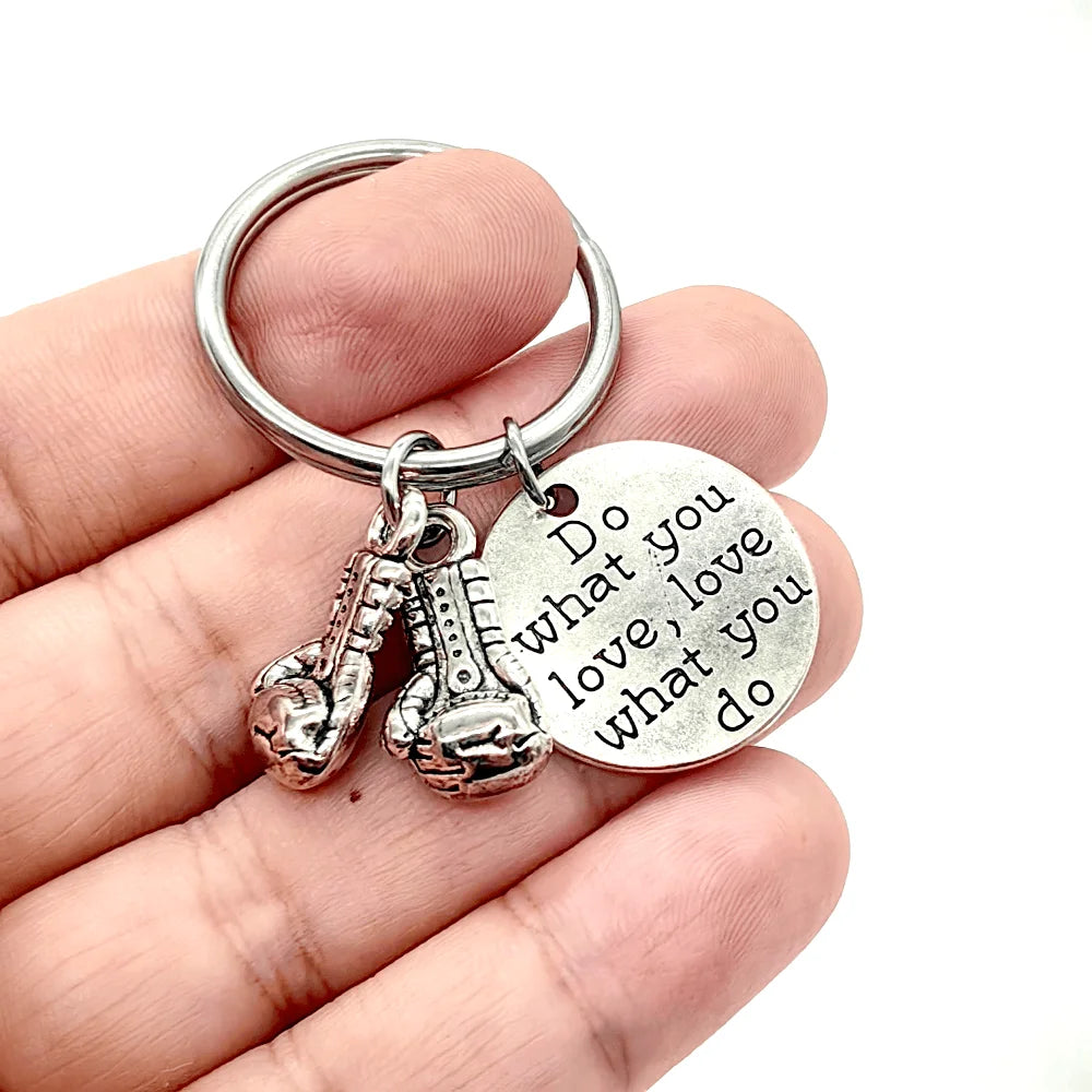 Keychain With The Positive Message ("Never never give up!"/"Be stronger than the storm"/"Do what you love, love what you do") With Boxing Gloves - 3 Styles