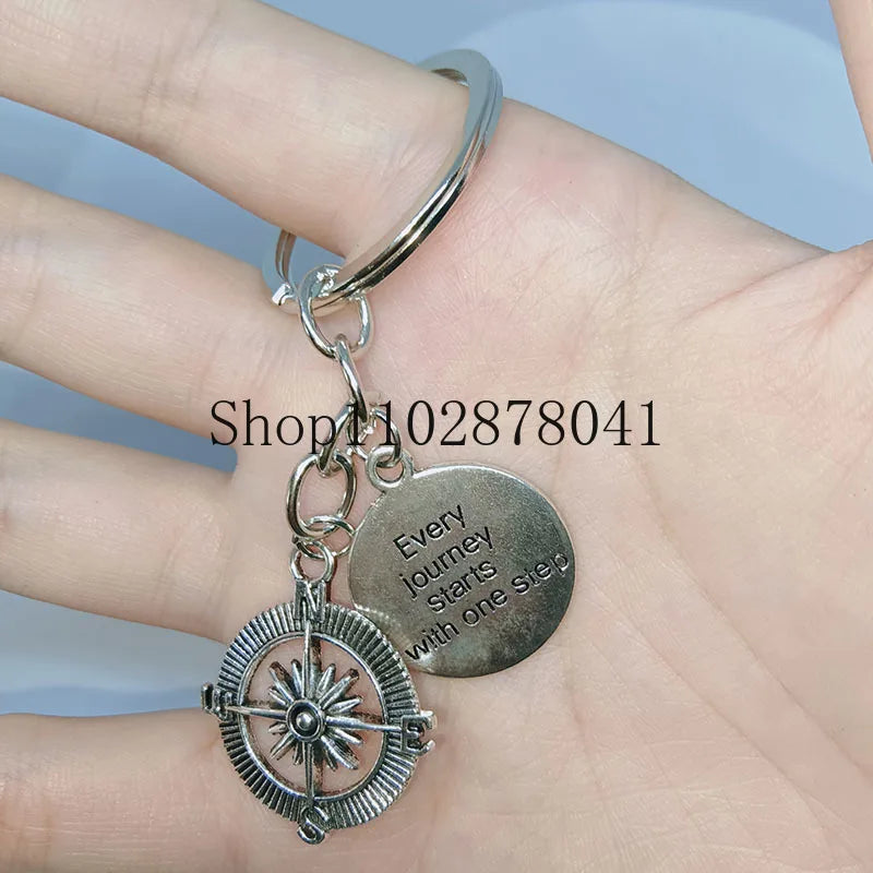 Keychain With The Positive Message ("Every journey starts with one step") With Compass