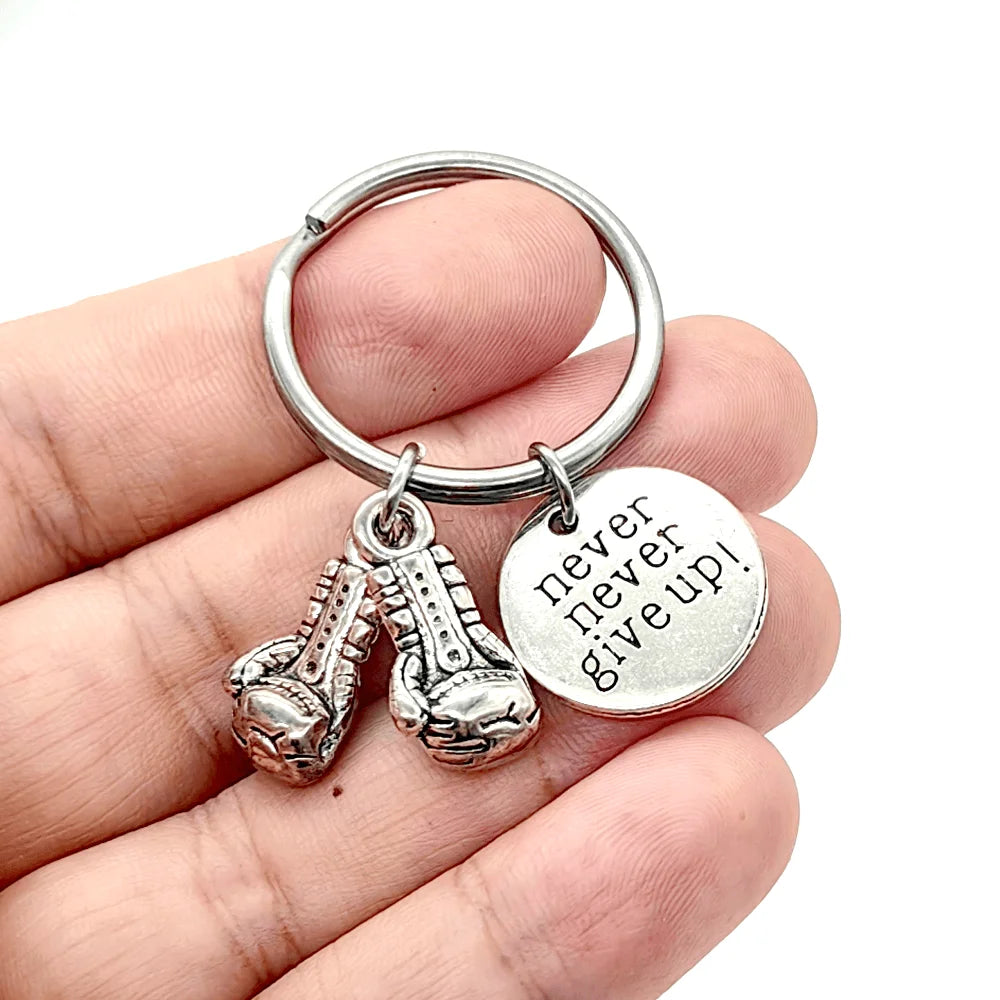 Keychain With The Positive Message ("Never never give up!"/"Be stronger than the storm"/"Do what you love, love what you do") With Boxing Gloves - 3 Styles